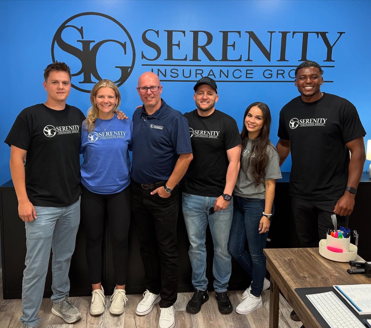 The Serenity Insurance Group team at their office